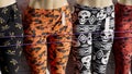 Colorful row of womens patterned Halloween leggings